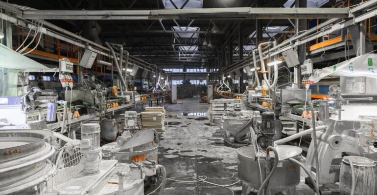concrete-mixing-tank-factory-dusty-machines-other-tools-sand-concrete-processing-production-scaled.jpg